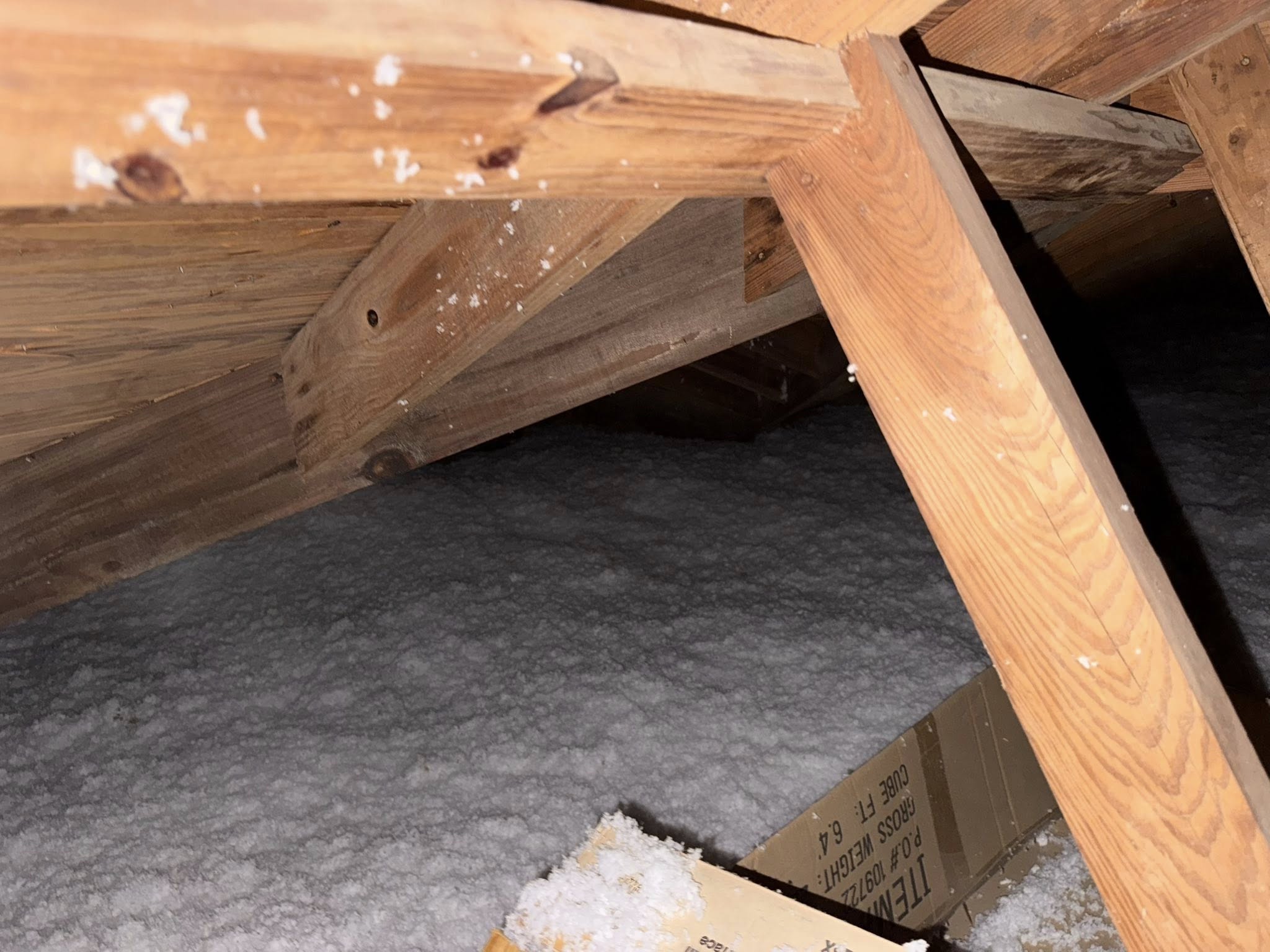 Blown-in insulation in attic area