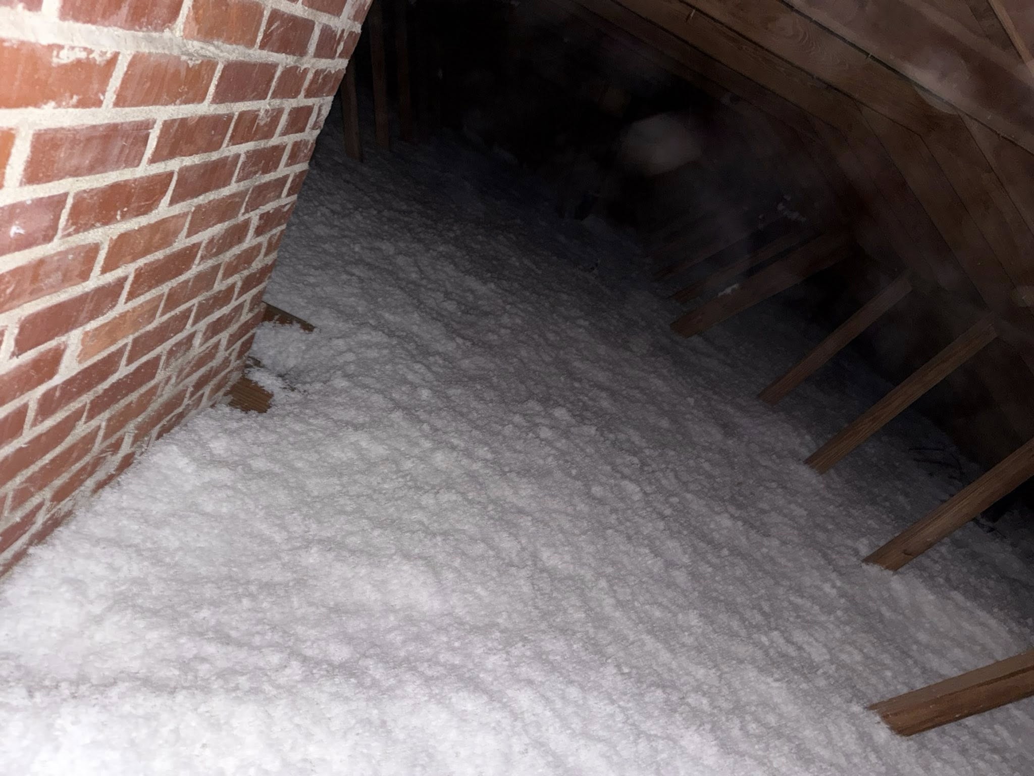 Blown-in insulation in attic
